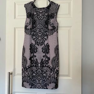 R&k dress size 12 new with tags. MIDI length